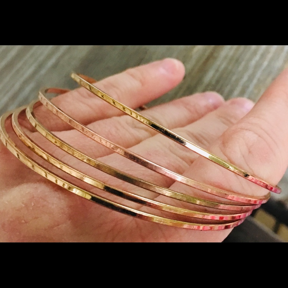 Set of five copper bangles